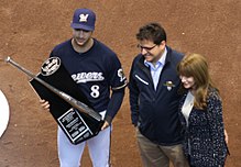Braun accepting his 2011 Silver Slugger Award from Brewers owner Mark Attanasio