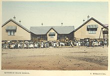 Queenton State School, 1904 StateLibQld 2 258454 Queenton State School and students, Charters Towers, 1904.jpg