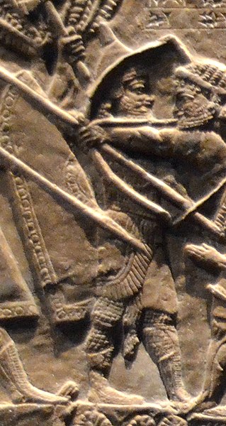 File:Tammaritu (behind the bow), son of Urtak, leading Assyrian troops against Teumman, king of Elam.jpg