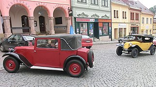 Tatra 57 (left) and Tatra 11 (right).