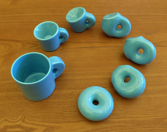 A continuous transformation can turn a coffee mug into a donut. Ceramic model by Keenan Crane and Henry Segerman.