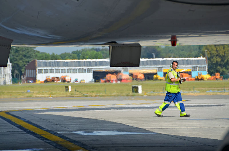 File:What it means to be..tower pusher @ Brussels Airport (7975516041).jpg