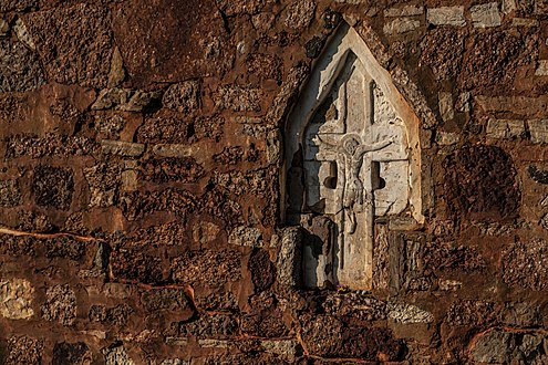 Medieval cross embedded in the wall of Transfiguration Church in Kovalyovo, Novgorod Oblast by Vladimir Pankratov