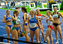 International level women athletes at ISTAF Berlin, 2006 100 metres race winner Sina Schielke (192) and the other Runners - ISTAF 2006 - Berlin, 3 September.jpg