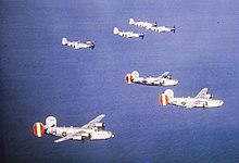 P-51 Mustangs of the 352nd Fighter Group escorting B-24 Liberator bombers of the 458th Bombardment Group over the North Sea 458 BG 352 FG FRE 006713.jpg