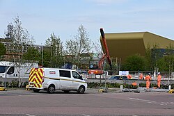 Construction workers laying new paving slabs at Kingston Retail Park for the A63 in Kingston upon Hull.