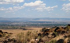 View of downtown Albuquerque and the Manzano Mountains from the West Mesa ABQ-West-Mesa.jpg