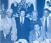 Wallace (right, seated) hosting a highway safety conference in 1975 Alabama highway safety conference.png