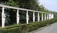 The Alley of Caryatids in the Herăstrău Park (Bucharest, Romania), dressed like Romanian peasant women