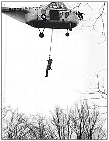 Local doctor Wilfred W. Wilcox lowered to crash site by U.S. Air Force helicopter Allegheny Airlines Flight 371 (2001888080).jpg