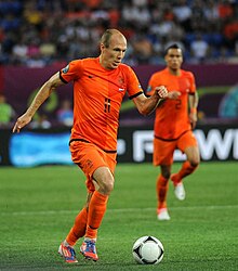 Although naturally left-footed Arjen Robben (left, 11) has often been deployed as an inverted winger on the right flank throughout his career, which allows him to cut inside and shoot on goal with his stronger foot.