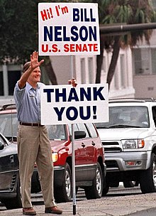 Bill Nelson with a "thank you" sign after his victory. Bill Nelson with thank you sign after his election to United States Senate in 2000.jpg