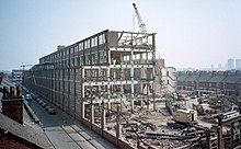 The older of the factory buildings, known as "Union Works", of British United Shoe Machinery being demolished, 1987 British United Shoe Machinery demolishing older factory building, Leicester, 1987.jpg