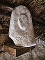 A statue based upon British Iron Age examples, found in the Moel y Gerddi roundhouse.