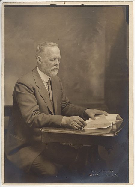 Charles W. Woodworth reading.jpg