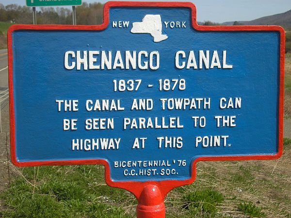 Historic marker of the Chenango Canal, canal and towpath at North Norwich, New York.