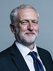 Official portrait of a white man wearing a suit