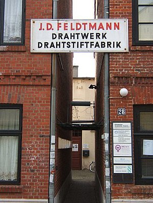 Eingang zum Stadtteilarchiv und zur Dauerausstellung „Drahtstiftefabrik Feldmann“