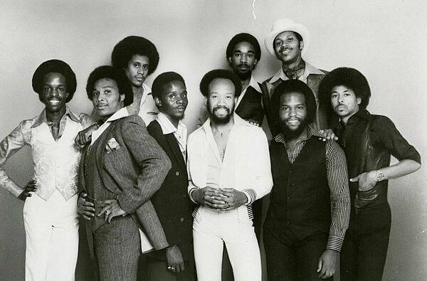 Earth, Wind, & Fire c. 1977. Front, from left: Verdine White, Al McKay, Philip Bailey, Maurice White, Andrew Woolfolk, Ralph Johnson. Back, from left: