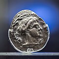 Eleutherna - 330 BC - silver stater - head of Apollon - Apollon with bow and round object - Chania AM