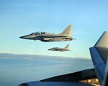 Two FA-50 Golden Eagle light multi-role fighter/LIFTs escorting a Philippine Airlines flight carrying President Benigno S. Aquino III FA-50 Golden Eagle (Philippine Air Force, February 19, 2016).jpg