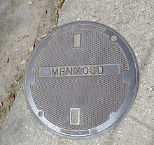Metromedia Fiber Network manhole cover, Uptown New Orleans. Freret Street New Orleans MFN CSD Manhole Cover.jpg