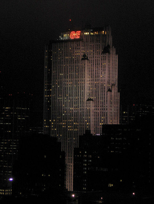 The show originates from the Comcast Building, pictured in 2005 when it was the GE Building, at 30 Rockefeller Plaza in New York City.