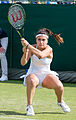 Gabriella Taylor competing in the first round of the 2015 Wimbledon Qualifying Tournament at the Bank of England Sports Grounds in Roehampton, England. The winners of three rounds of competition qualify for the main draw of Wimbledon the following week.