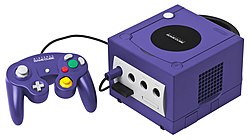 Indigo-colored GameCube with controller and memory card