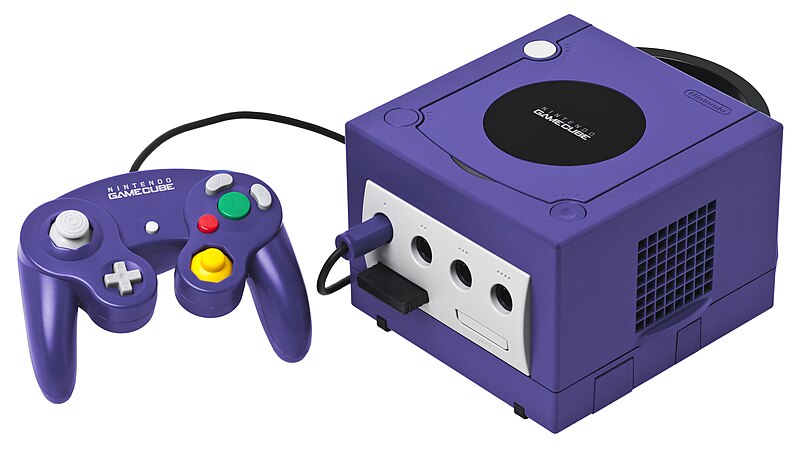 A purple GameCube with standard controller and one memory card inserted.