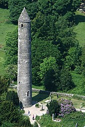 An Irish round tower, bell tower, at Glendalough, Ireland, c. 900 AD