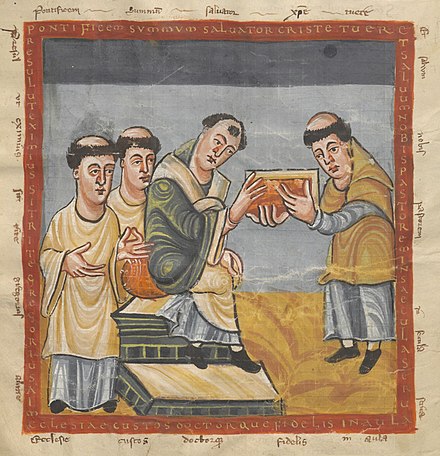 Gregory IV (in the middle) receives a book from Rabanus Maurus (on the right)