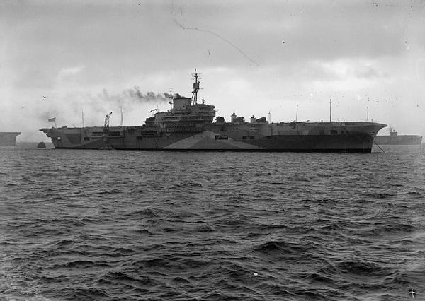 Profile view of Indefatigable at anchor