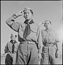 Boy Scouts conducting a morning flag raising cermony at the Heart Mountain Relocation Center on June 5, 1943