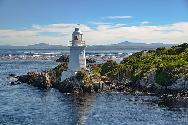 Photo of the lighthouse on Bonnet Island, Hells gate, Tasmania (looking out from Harbour)