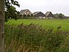 Hallenhuisboerderij op terp met schuren "De Kleine Wuuste"