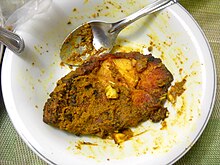 Ikan goreng kunyit, fried fish spiced with turmeric. Ikan goreng kunyit.JPG