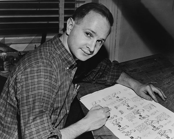 Feiffer in 1958 with pictures from his first book
