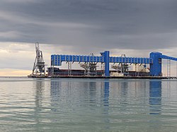 A bulk carrier moored at the CBH Grain Jetty Kwinana Grain Terminal on a stormy evening, March 2021 04.jpg