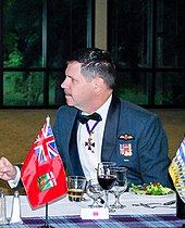 Lieutenant General Pierre St-Amand of the Royal Canadian Air Force in winter mess dress, 2016. Lt Gen Pierre St Amand at a Canadian Mess Dinner.jpg