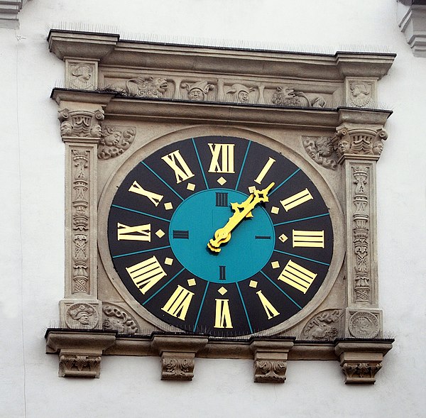 Main clock at the town hall at the market square