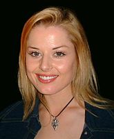 Joel dates Dee Bliss, played by Madeleine West (pictured), and ends up in a love triangle with her and her best friend. Madeleine West 2001.jpg