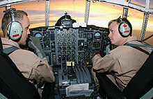 Major Colin Keiver and Captain Michael Parish in the cockpit of a USMC VMGR-252 KC-130 Hercules aircraft during Operation ENDURING FREEDOM.jpg