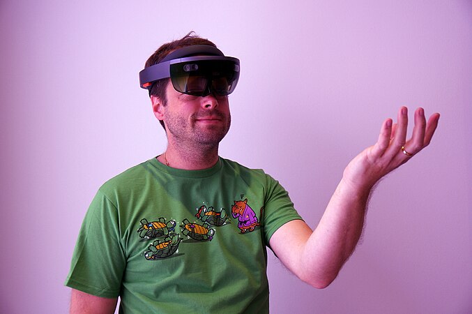 A man using HoloLens.