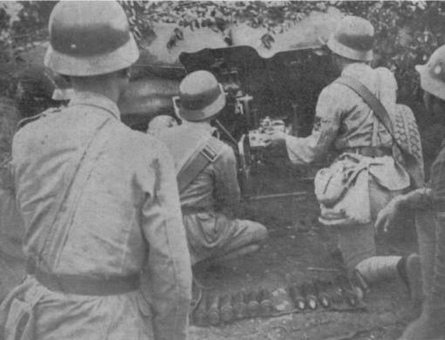 National Revolutionary Army of China with M1935 helmets and using a 3.7 cm Pak 36 anti-tank gun