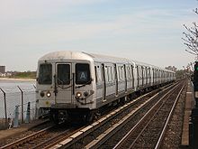 An overhauled NYCT R44 train on the A approaching Broad Channel NYCSubway5274.jpg