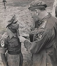 Naik Narayan Sinde receives the Indian Distinguished Service Medal from General Sir Claude Auchinleck, 1945
