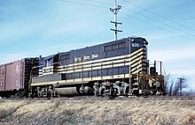 Nickel Plate Road (NKP) 526 (GP9) swtching way freight at Gibson City, IL on November 24, 1962 (21931045314).jpg