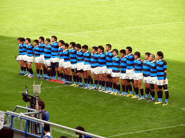 Nippon Sport Science University Rugby Football Club players wearing their light and dark blue colors