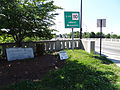 The stone dedication monument for the O'Donnell Bridge. Located at the northwest end of the O'Donnell Bridge at the intersection of Varnum Avenue and Mammoth Road in Lowell, Massachusetts.